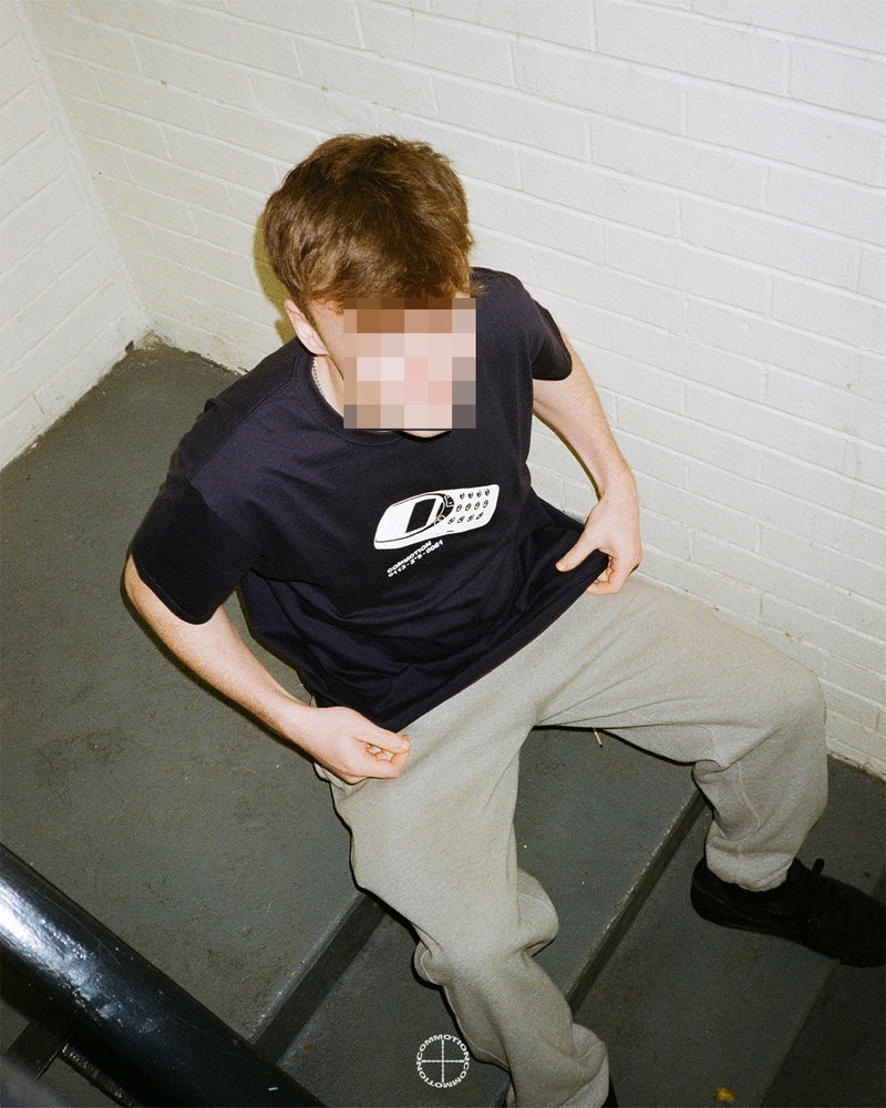 ONE YEAR ANNIVERSARY BURNER TEES) WORN BY OSKAR
